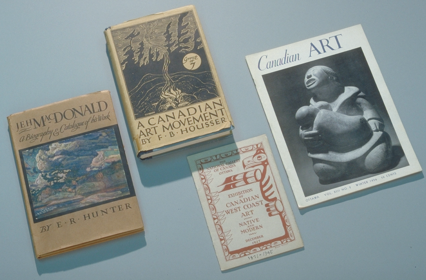 photograph of four books