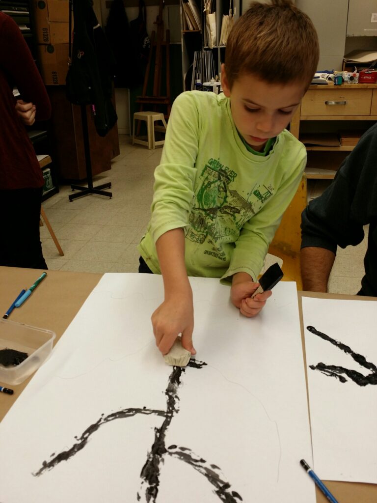 MicrosoftTeams-image (9) young boy drawing