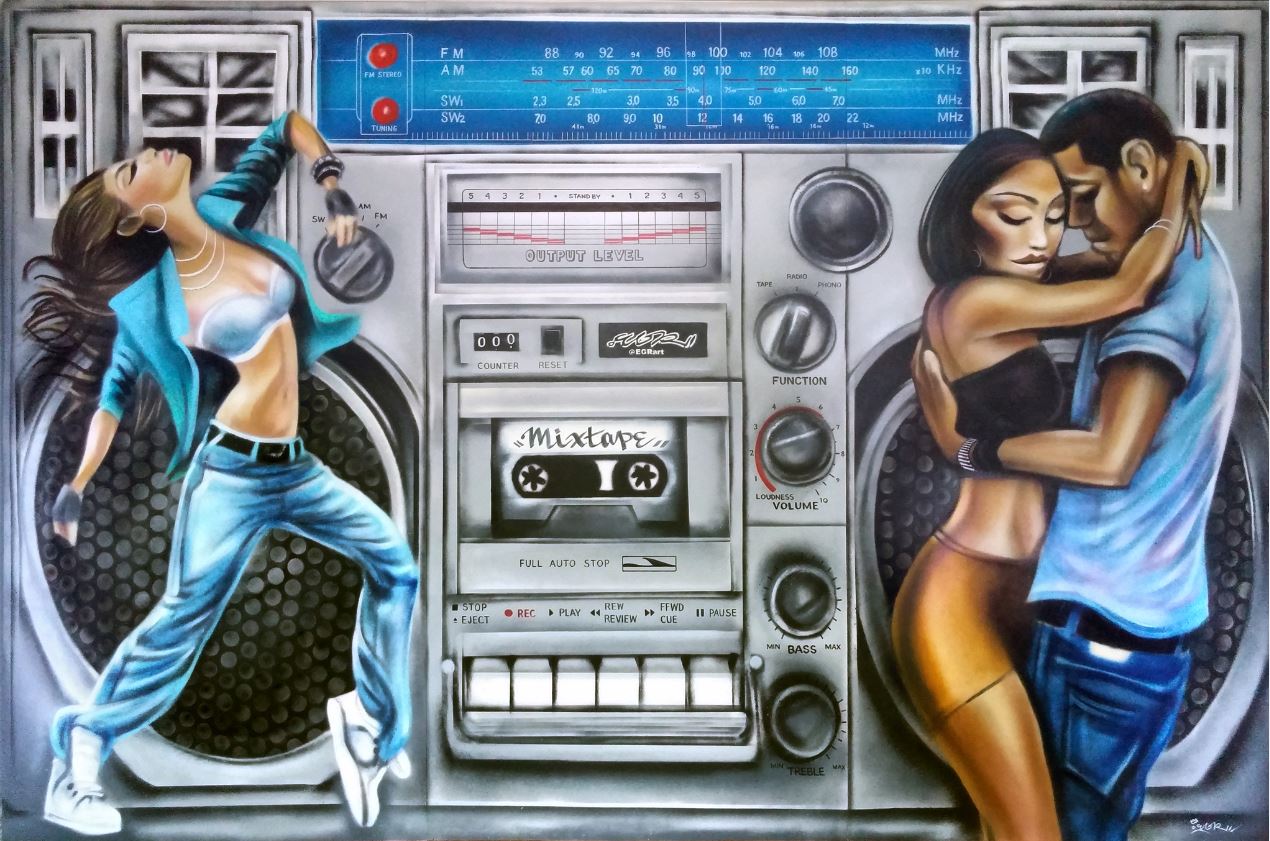 graffiti-style painting of a boom box with a couple embracing on the right and a woman dancing on the left