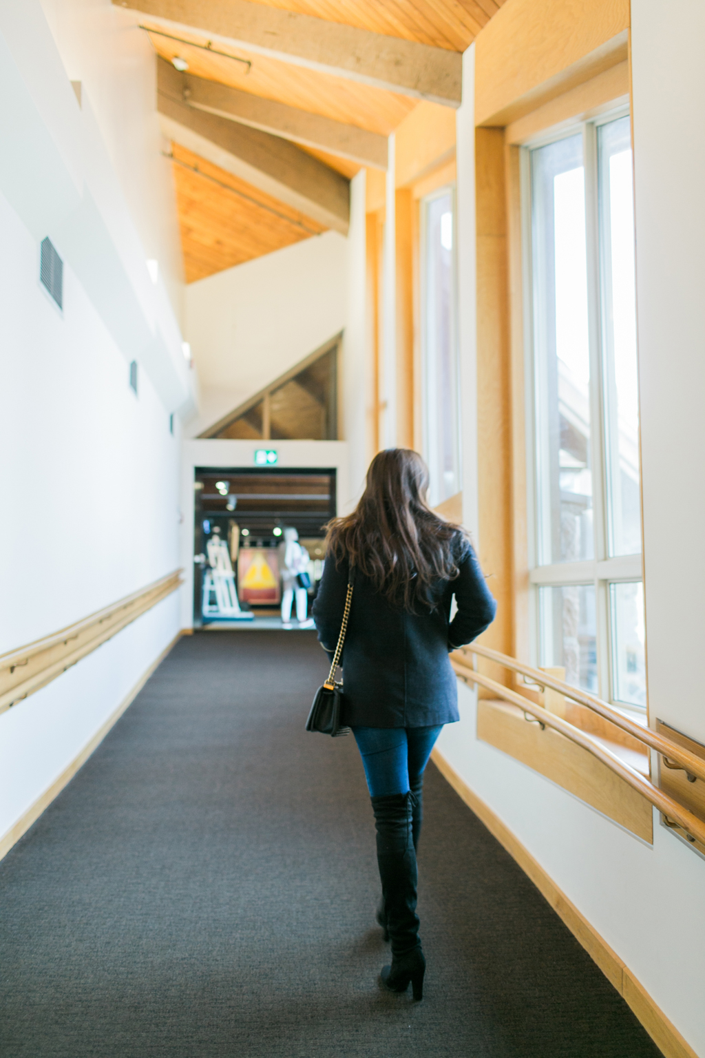 courtesy of Darlene Anderson photograph of rear view of woman walking in hallway